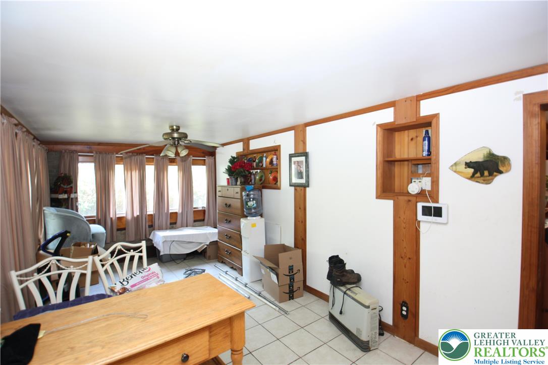 305 Cedar Hill Road Effort, PA 18330 - Photo 5 of 20 a living room with furniture rug and window