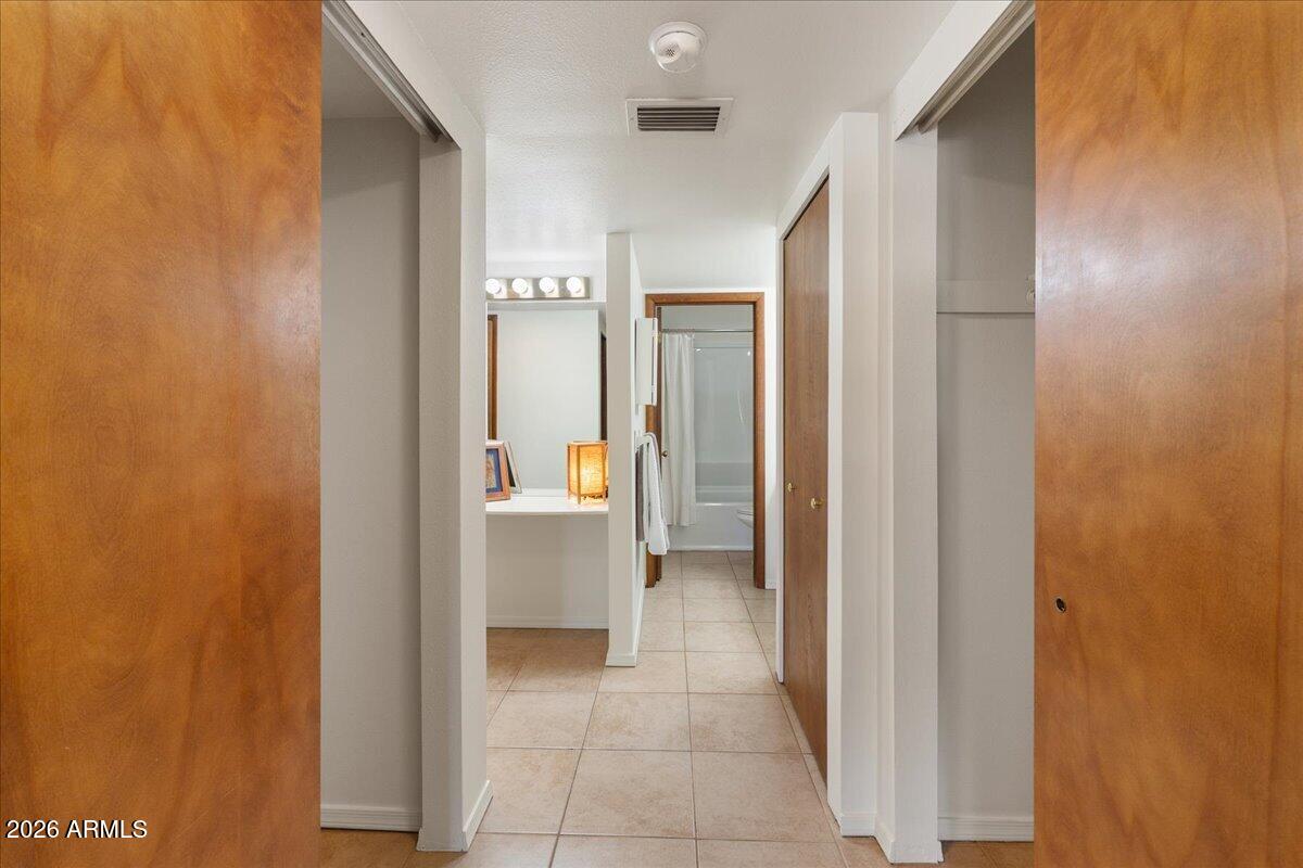 65 Verde Valley School Road, Unit H10 Sedona, AZ 86351 - Photo 15 of 20 a view of a bathroom from a hallway