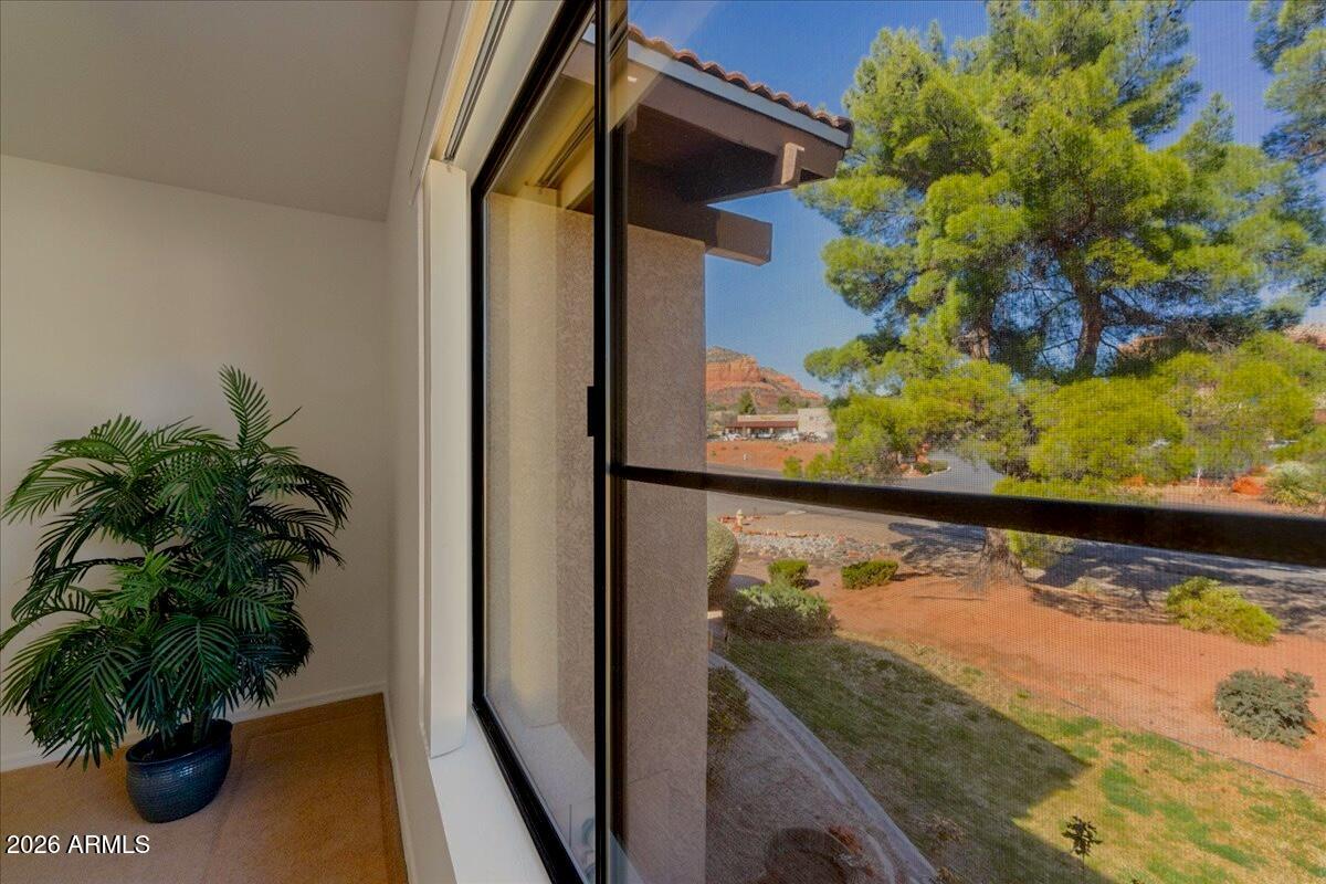 65 Verde Valley School Road, Unit H10 Sedona, AZ 86351 - Photo 18 of 20 a view of a balcony with plants