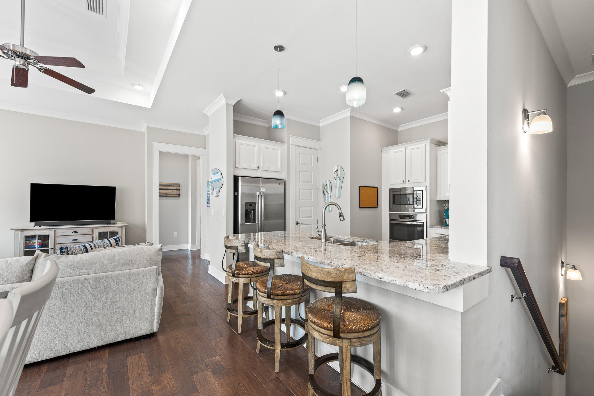 26 Milestone Dr Inlet Beach, Unit C Inlet Beach, FL 32461 - Photo 14 of 36 a living room with furniture and a flat screen tv