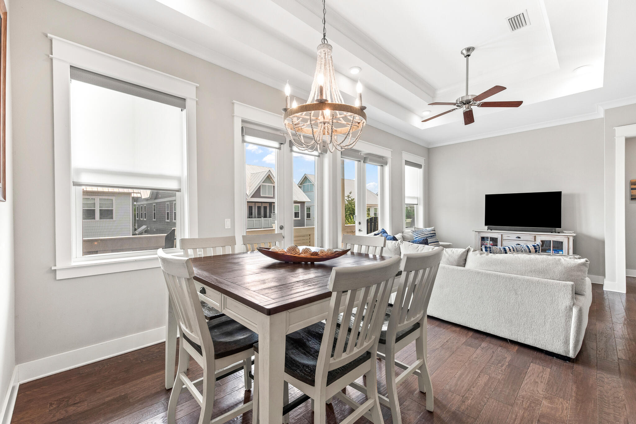 26 Milestone Dr Inlet Beach, Unit C Inlet Beach, FL 32461 - Photo 6 of 36 a view of a dining room with furniture wooden floor and chandelier