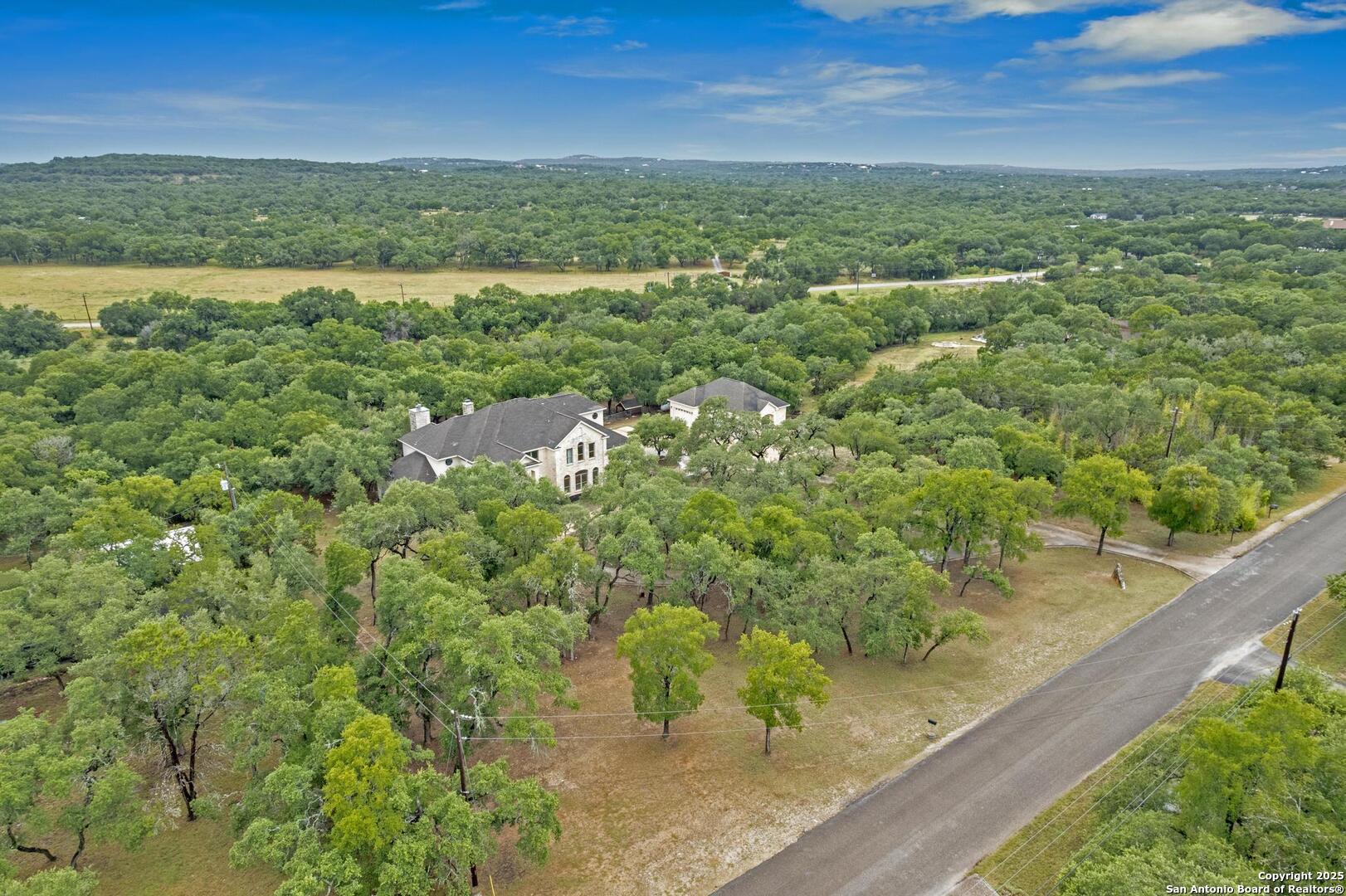 1130 Whispering Water Spring Branch, TX 78070 - Photo 31 of 43 a view of a yard with an outdoor seating