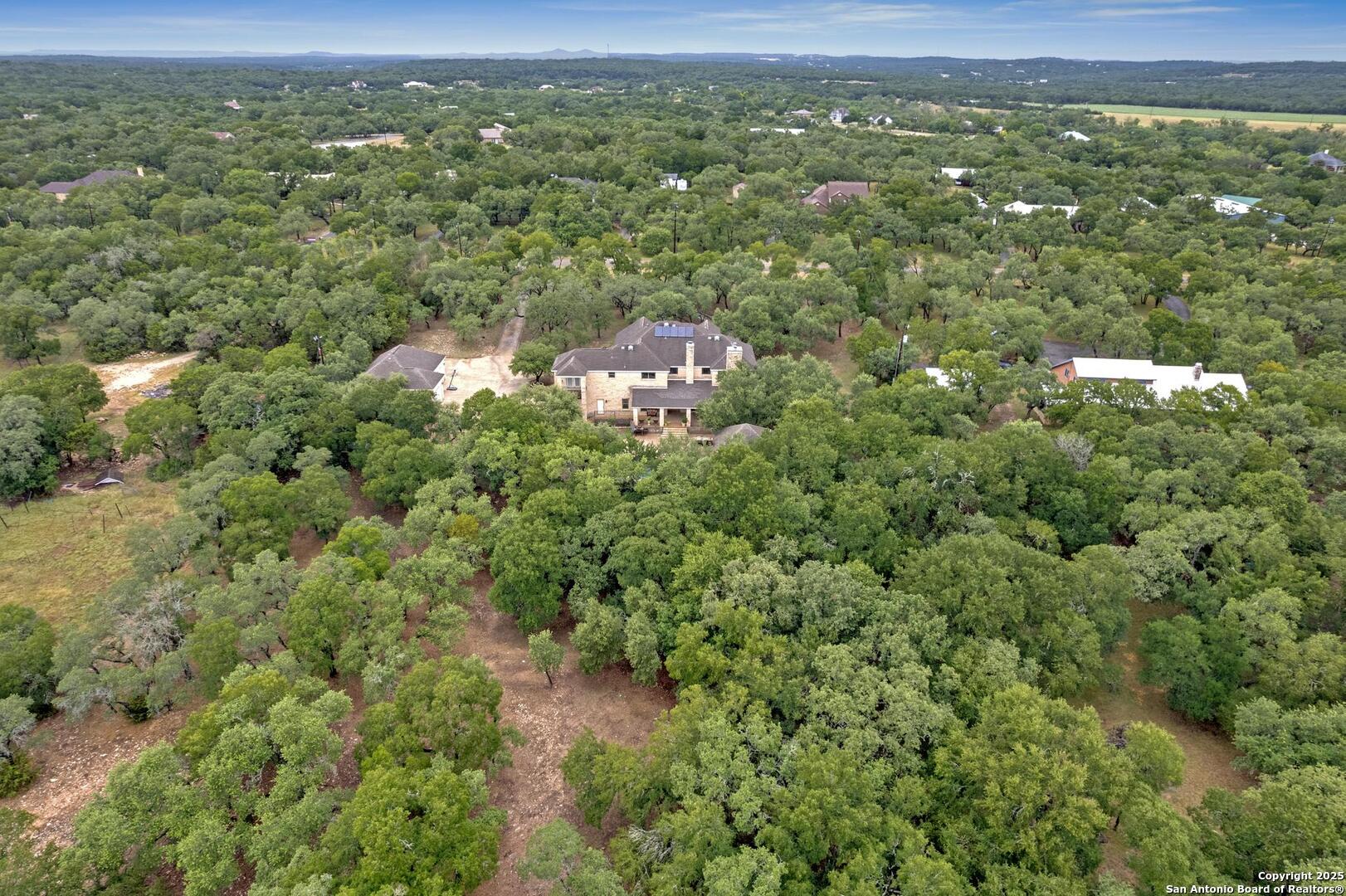 1130 Whispering Water Spring Branch, TX 78070 - Photo 35 of 43 a view of a city with green field