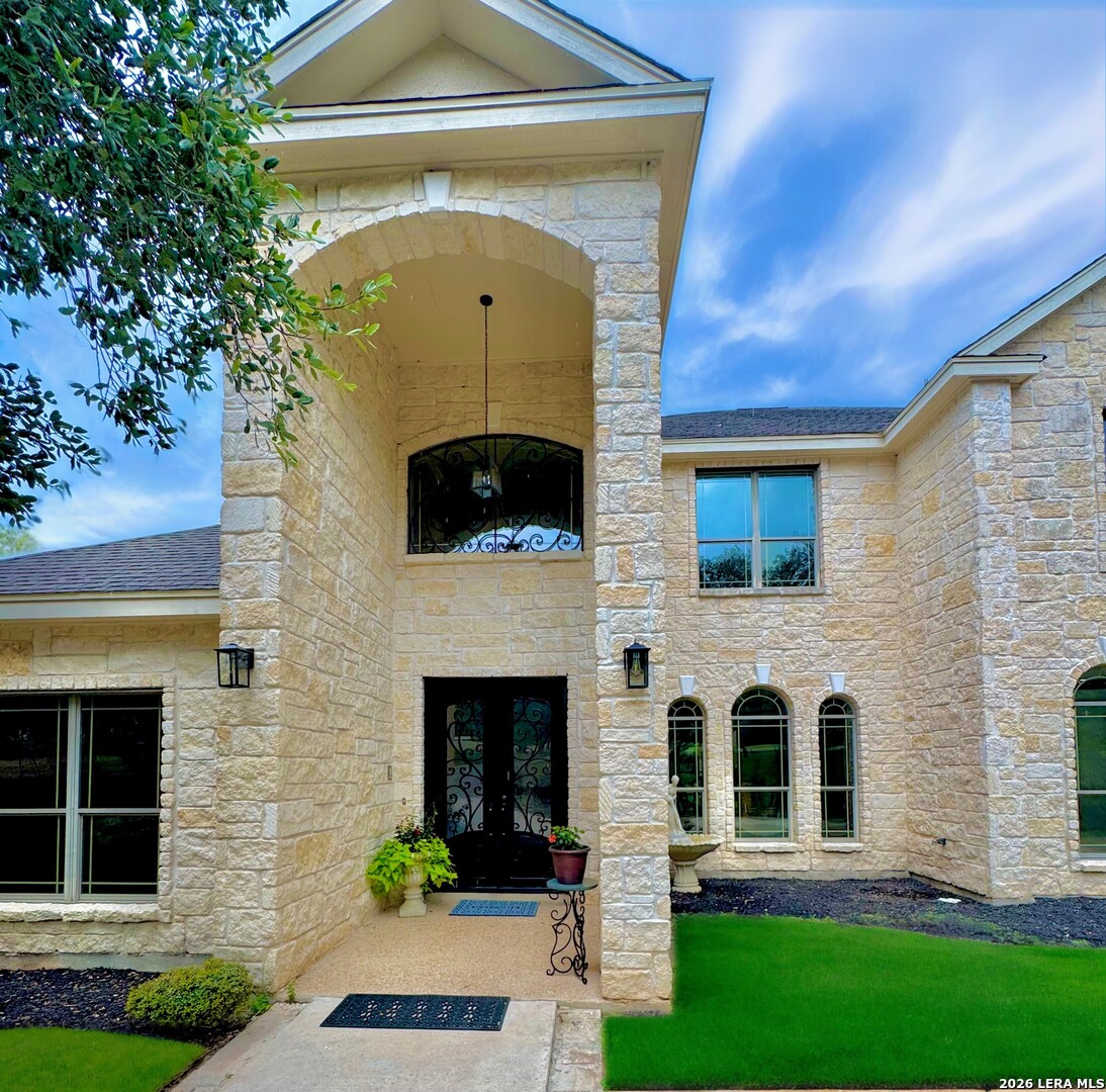 1130 Whispering Water Spring Branch, TX 78070 - Photo 36 of 43 a front view of a house with yard