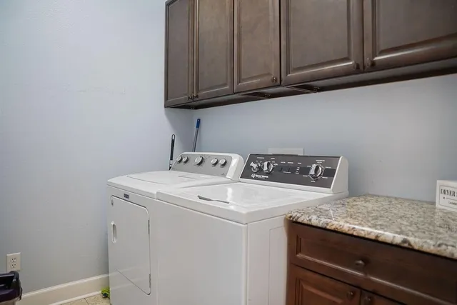 a view of room with window and wooden floor