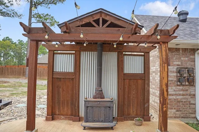 a view of a backyard with a small cabin
