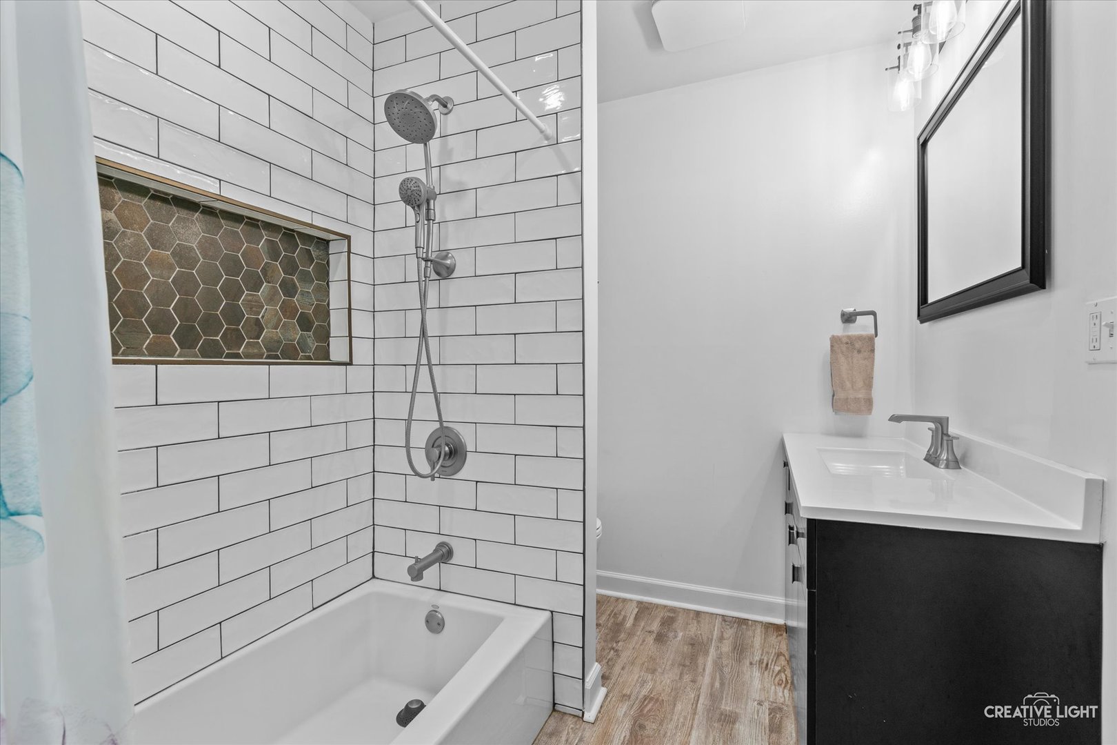 1800 East Algonquin Road Des Plaines, IL 60016 - Photo 14 of 26 a bathroom with a bathtub and shower