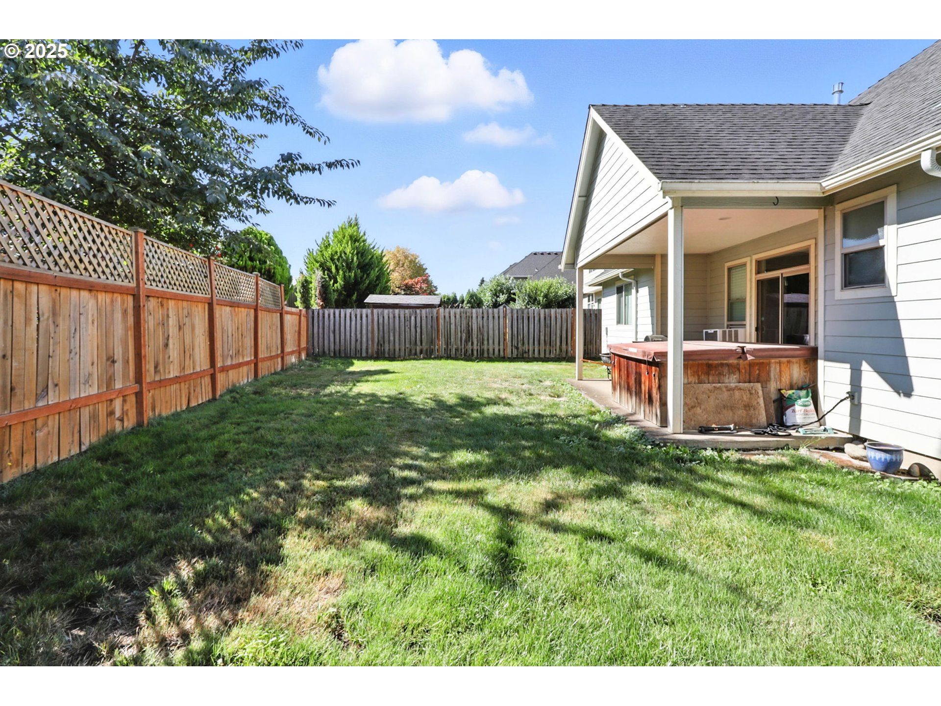 207 Finneys Avenue Molalla, OR 97038 - Photo 20 of 24 a view of a house with a yard and sitting area