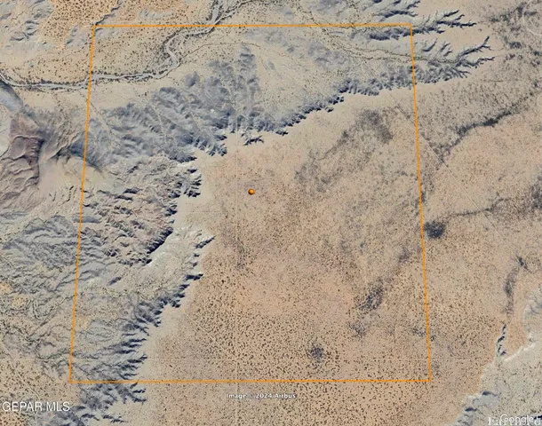 a bathroom with a shower curtain and a sink