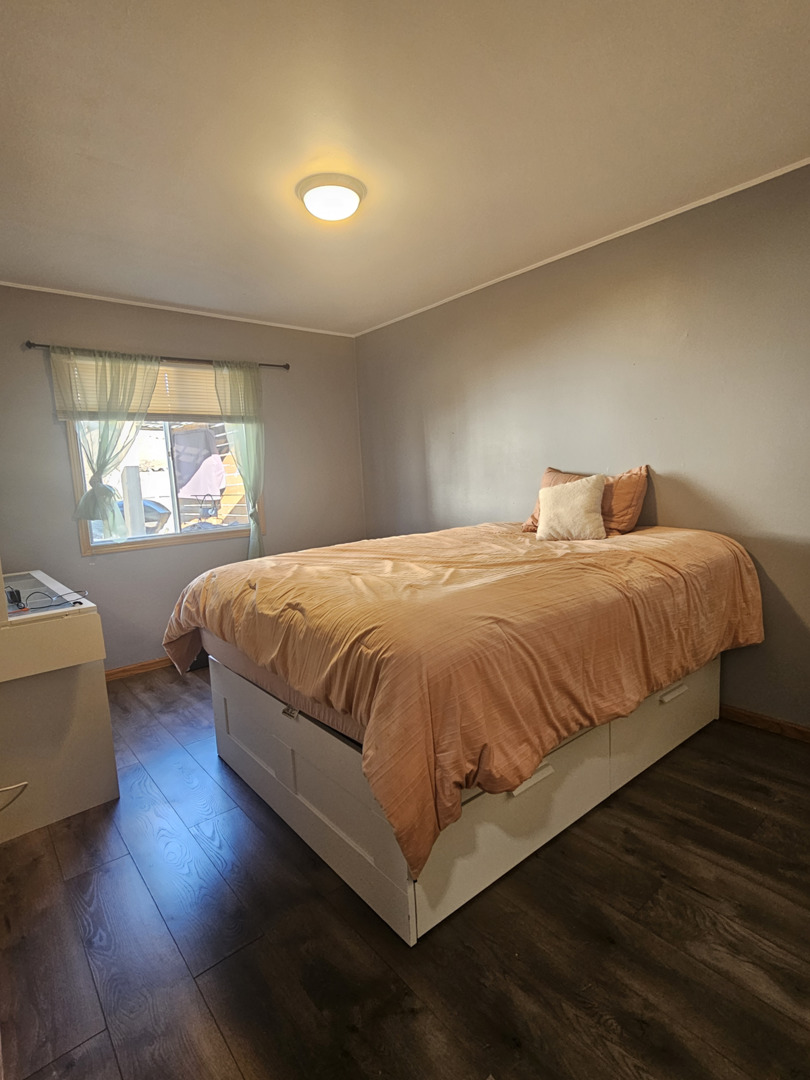 1353 Spring Valley Drive Carol Stream, IL 60188 - Photo 15 of 25 a bedroom with a bed and window