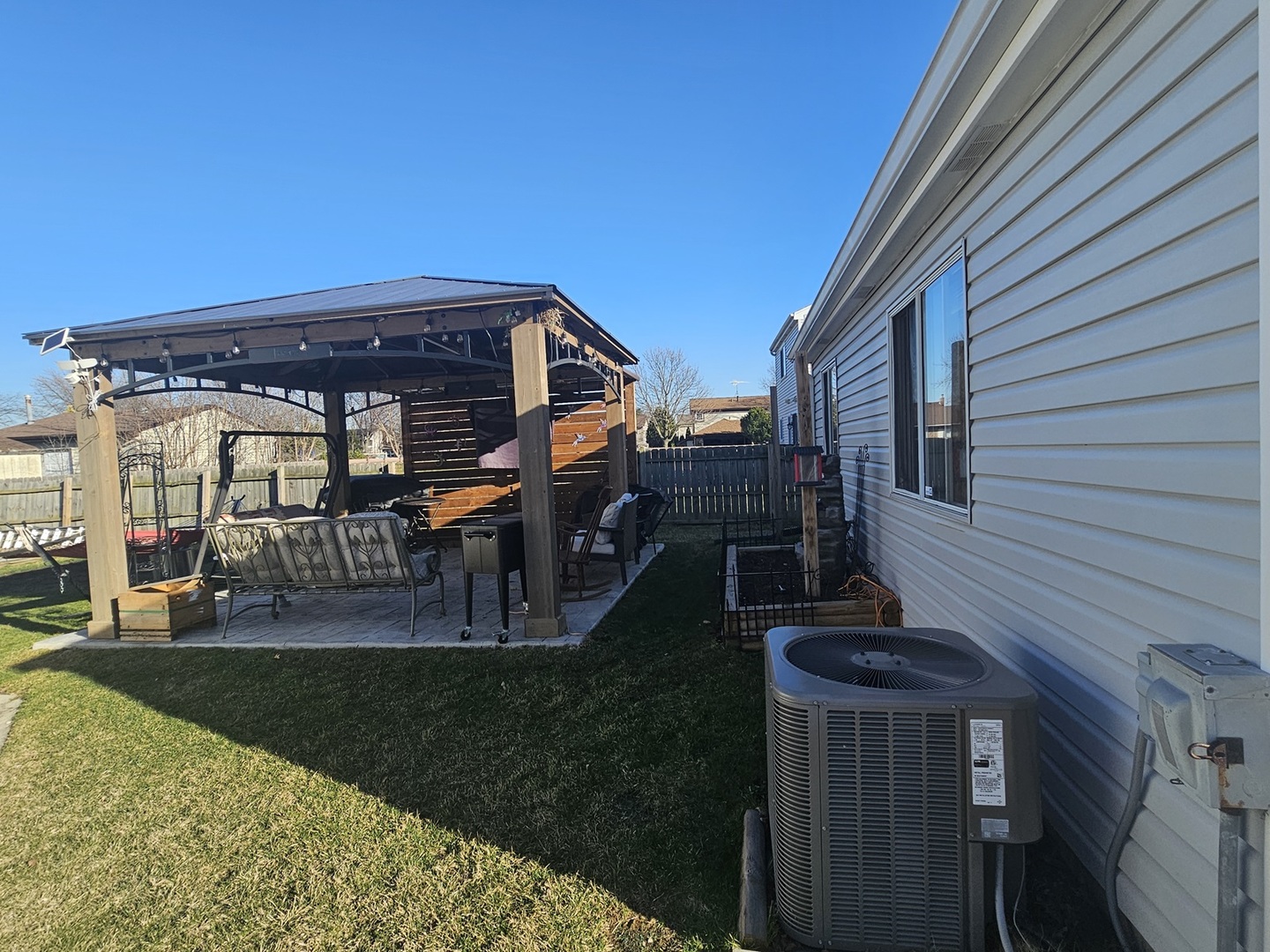 1353 Spring Valley Drive Carol Stream, IL 60188 - Photo 21 of 25 a view of a house with a yard