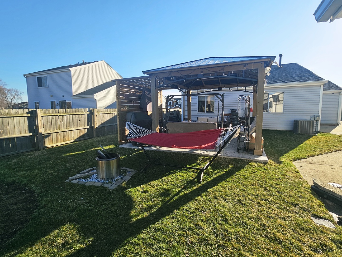1353 Spring Valley Drive Carol Stream, IL 60188 - Photo 22 of 25 a front view of a house with garden