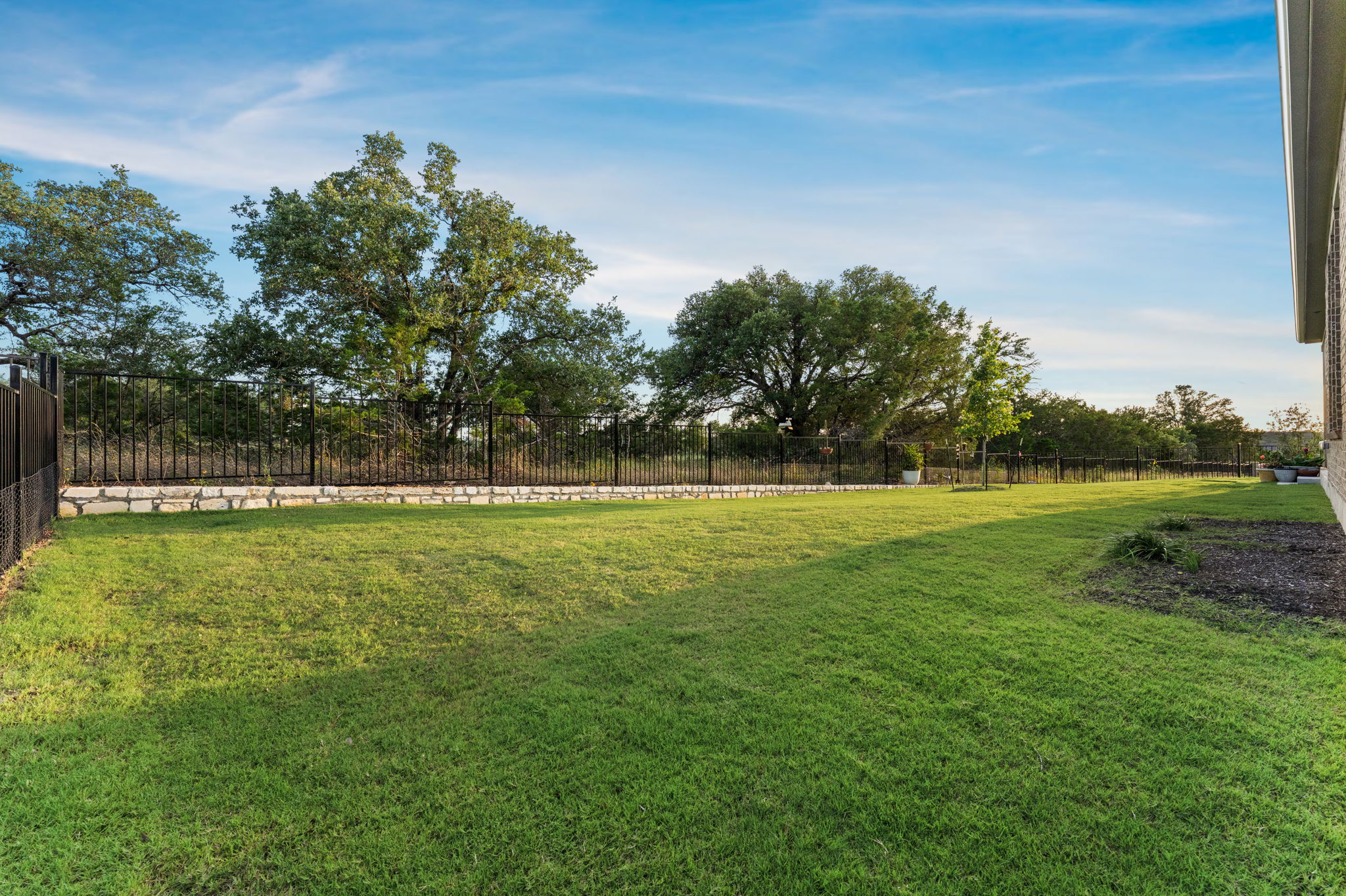 112 Telegraph Lane Georgetown, TX 78633 - Photo 26 of 35 There is plenty of green space in the 0.22-acre greenbelt lot.