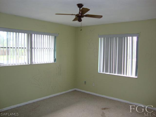 19055 Evergreen Road Fort Myers, FL 33967 - Photo 4 of 9 an empty room with a window
