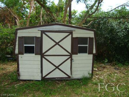 19055 Evergreen Road Fort Myers, FL 33967 - Photo 9 of 9 a view of front of a house with a yard