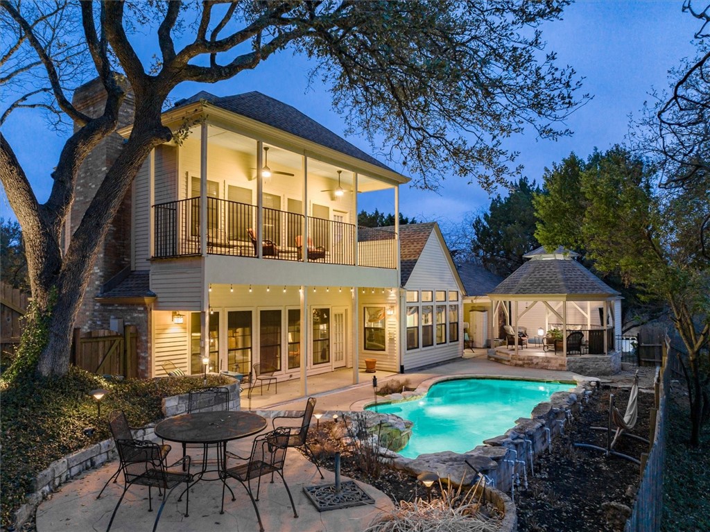 1908 Winter Park Road Austin, TX 78746 - Photo 1 of 1 a front view of a house with garden and patio