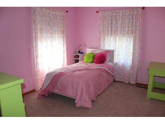 11897 Smith Road Pecatonica, IL 61063 - Photo 9 of 11 a bed room with a bed and a chair