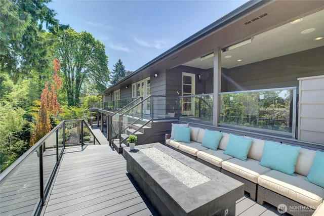 a bedroom with a large bed and a large window