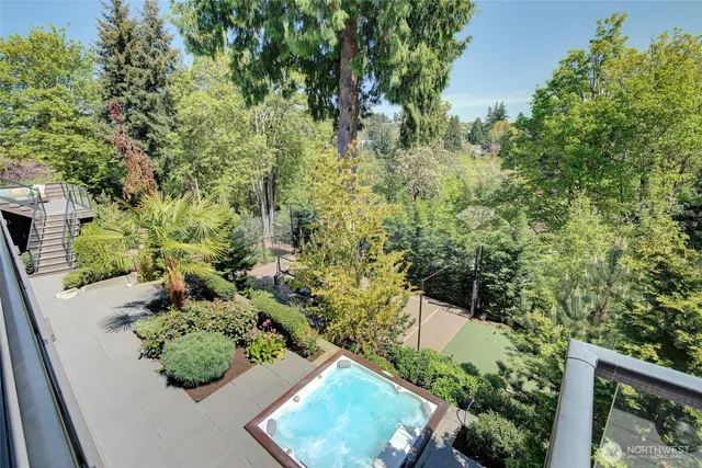 a bedroom with a large bed and a large window