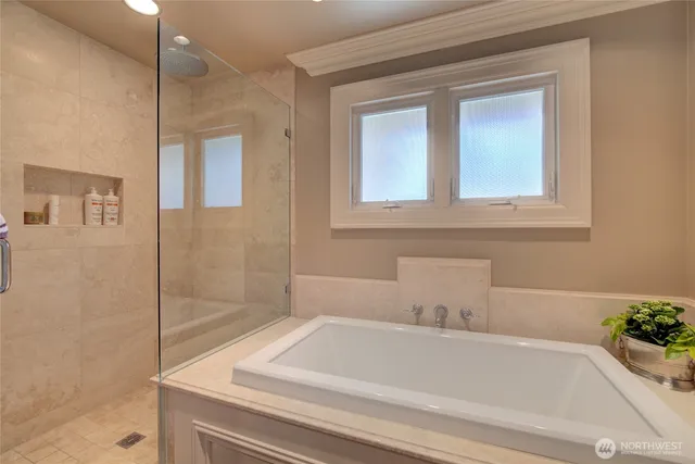 a kitchen with a sink and chandelier