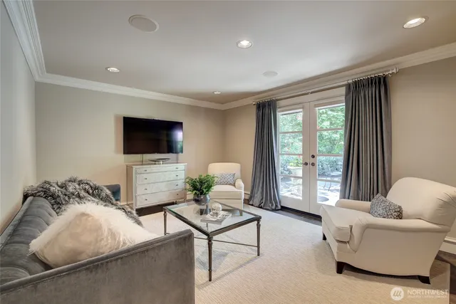 a view of a living room and dining room