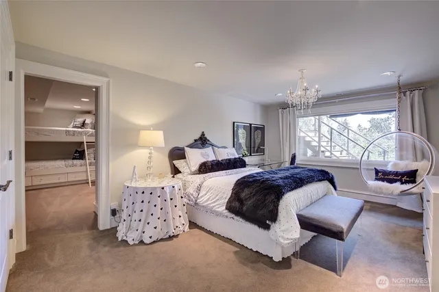 a bathroom with a double vanity sink toilet and shower