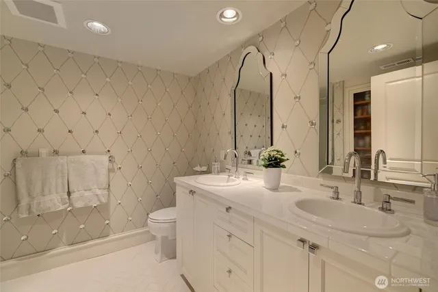 a bathroom with a bathtub and sink