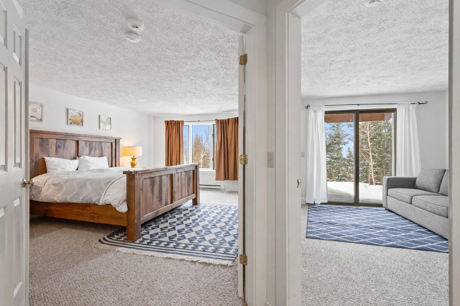 67 Rock Pond Road, Unit 1034 Sandy River Plt, ME 04970 - Photo 23 of 32 Lower Level Bed and Living