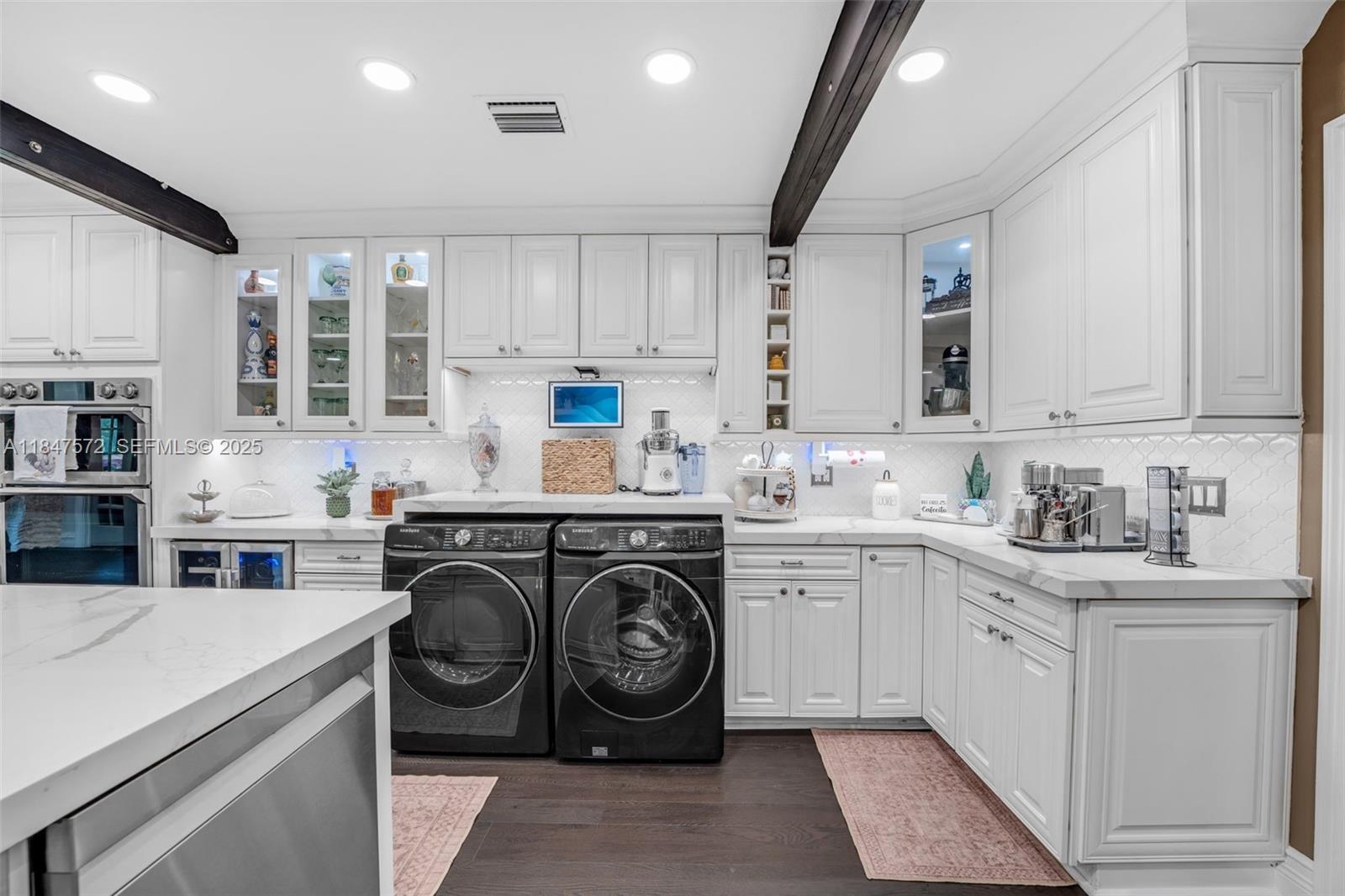 18200 Southwest 296th Street Homestead, FL 33030 - Photo 14 of 55 a view of a kitchen with stainless steel appliances granite countertop a sink and cabinets