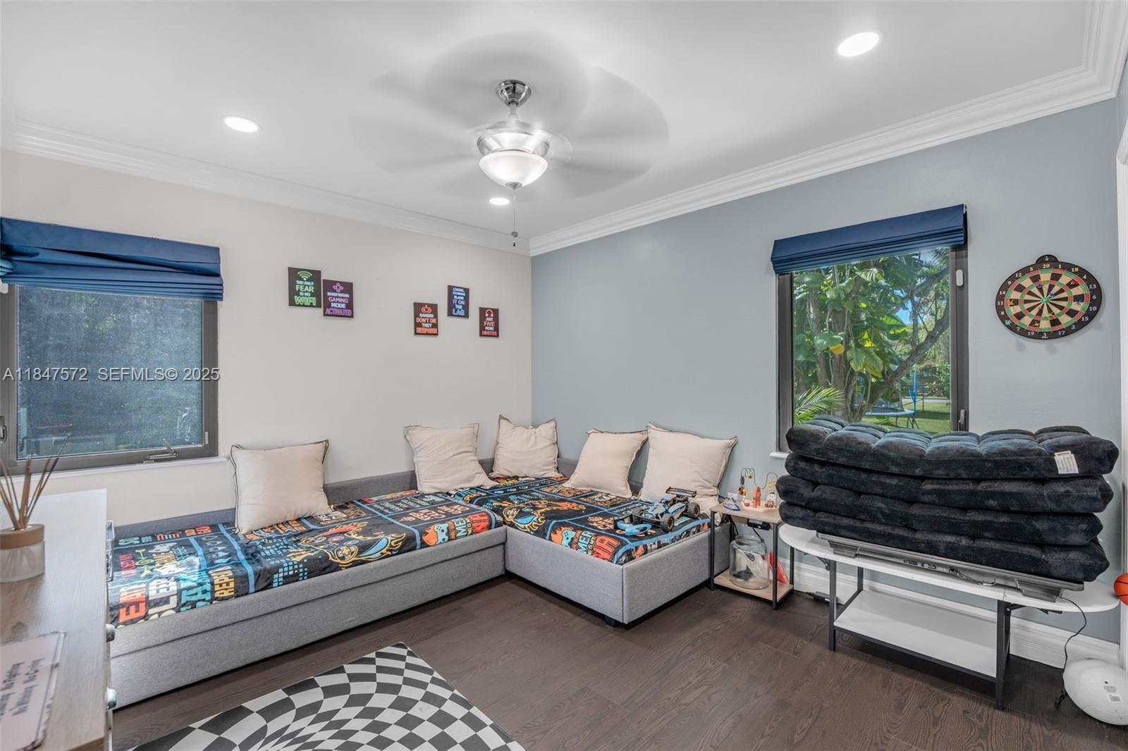 18200 Southwest 296th Street Homestead, FL 33030 - Photo 17 of 55 a bed room with furniture and a window