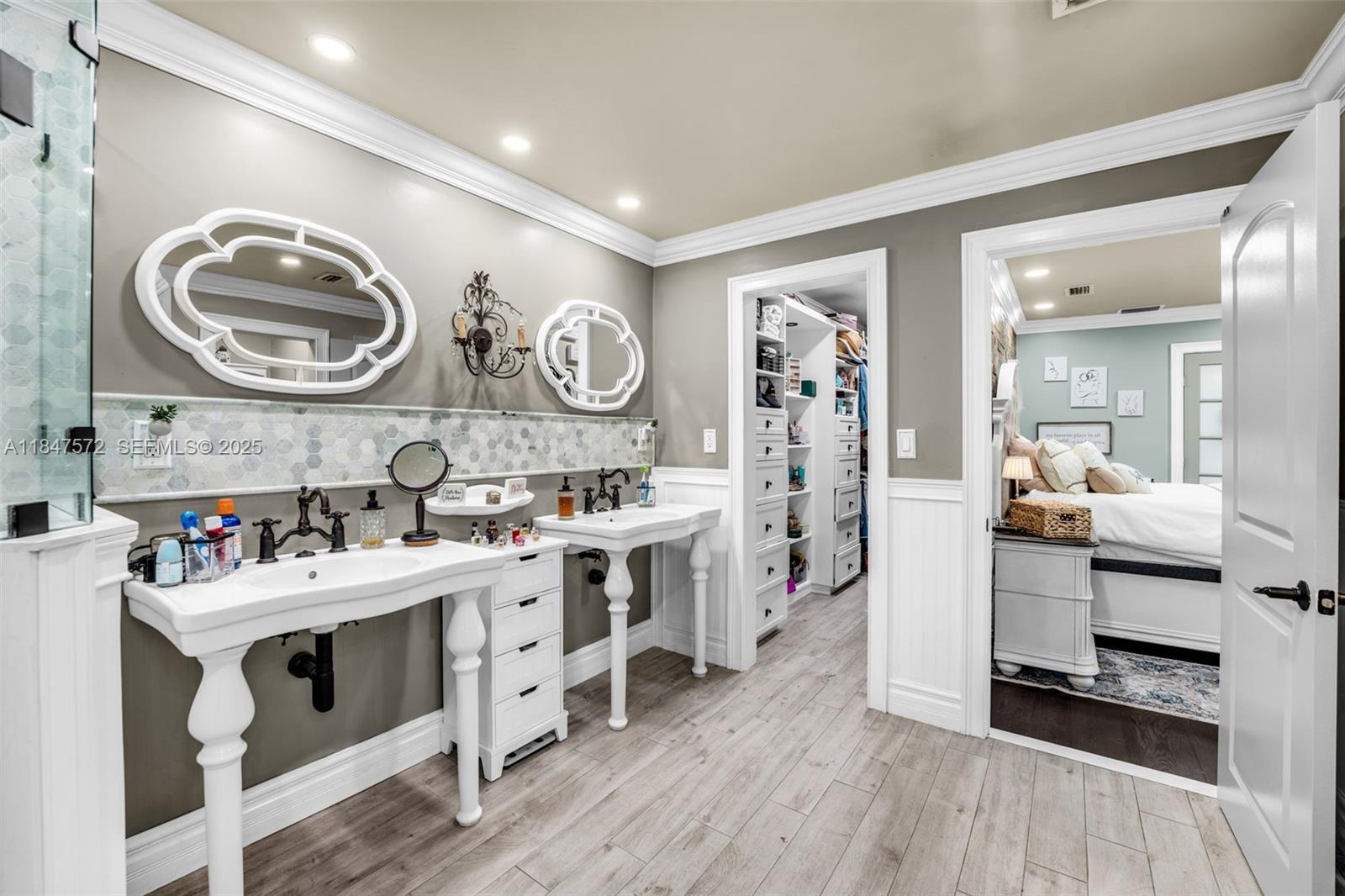 18200 Southwest 296th Street Homestead, FL 33030 - Photo 23 of 55 a kitchen with a stove oven and a wooden floor
