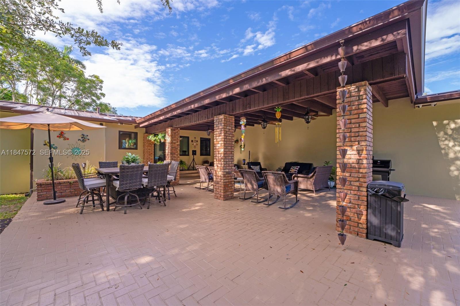 18200 Southwest 296th Street Homestead, FL 33030 - Photo 26 of 55 a view of outdoor space with seating area