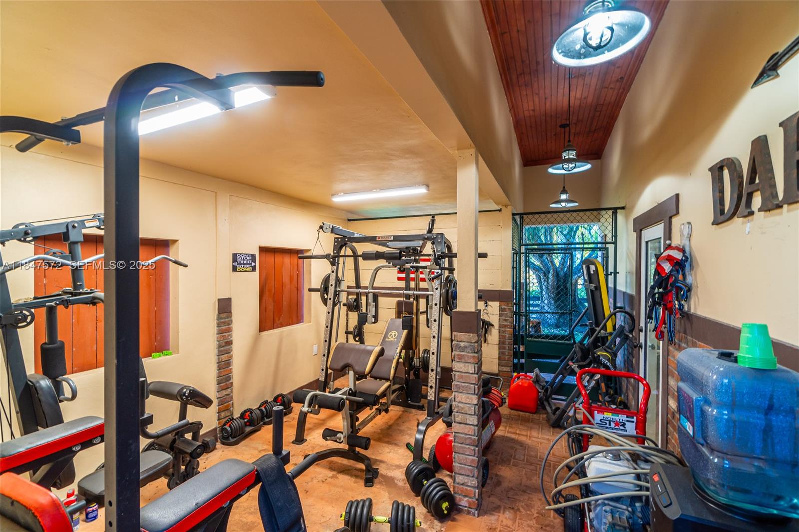 18200 Southwest 296th Street Homestead, FL 33030 - Photo 34 of 55 a view of a room with gym equipment