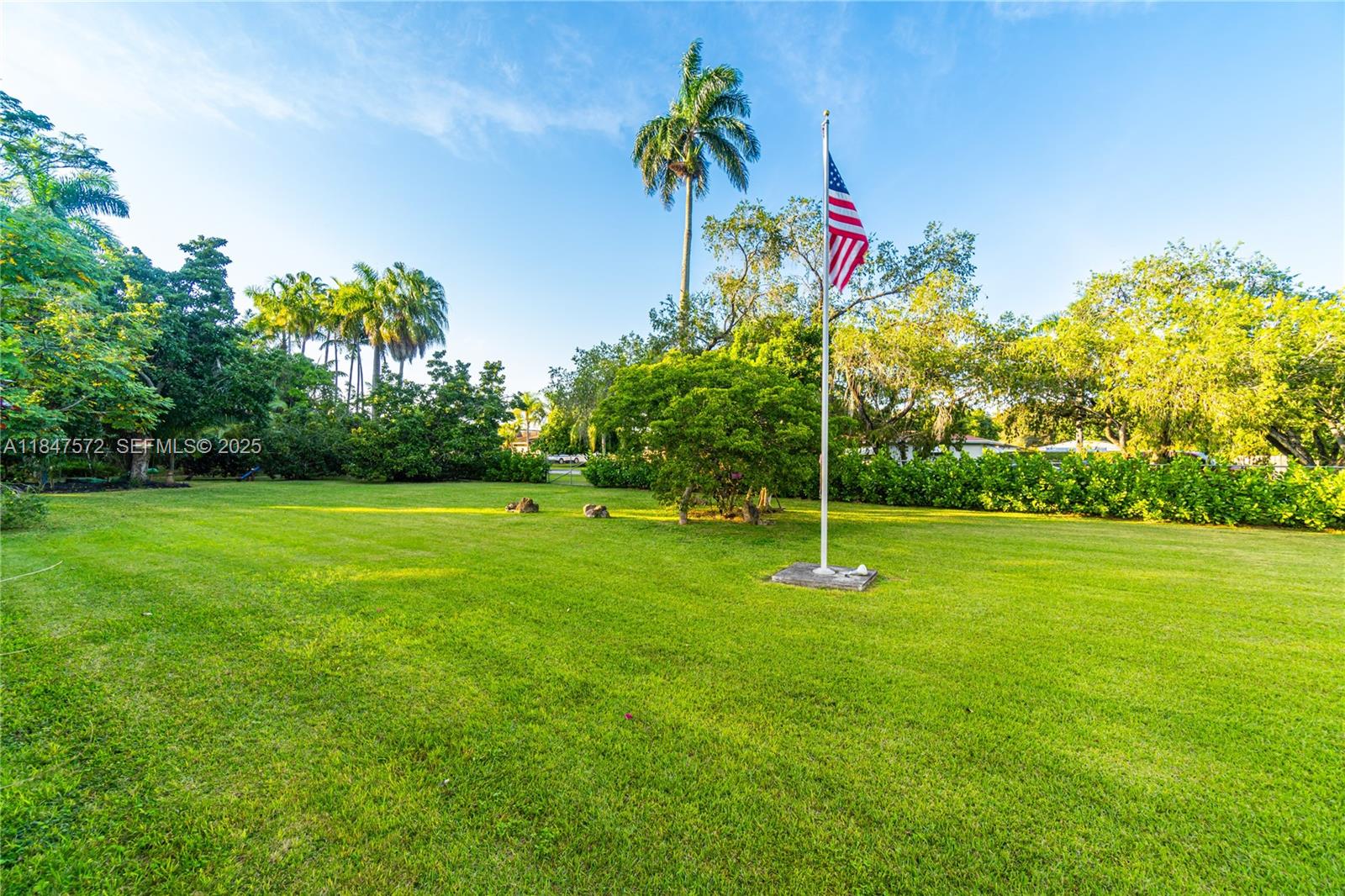 18200 Southwest 296th Street Homestead, FL 33030 - Photo 45 of 55 a backyard of a house with lots of green space