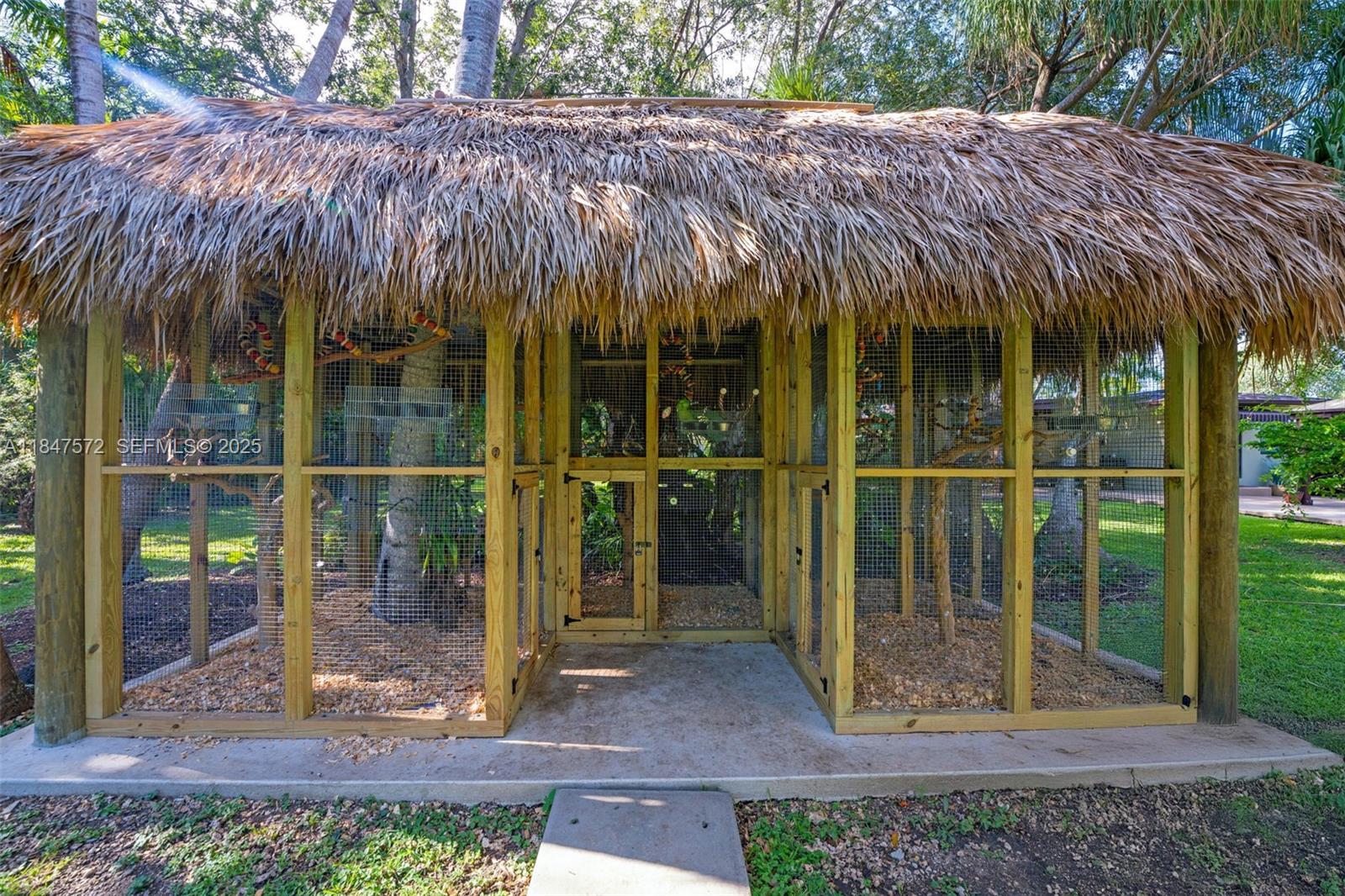 18200 Southwest 296th Street Homestead, FL 33030 - Photo 6 of 55 a view of small house with a yard