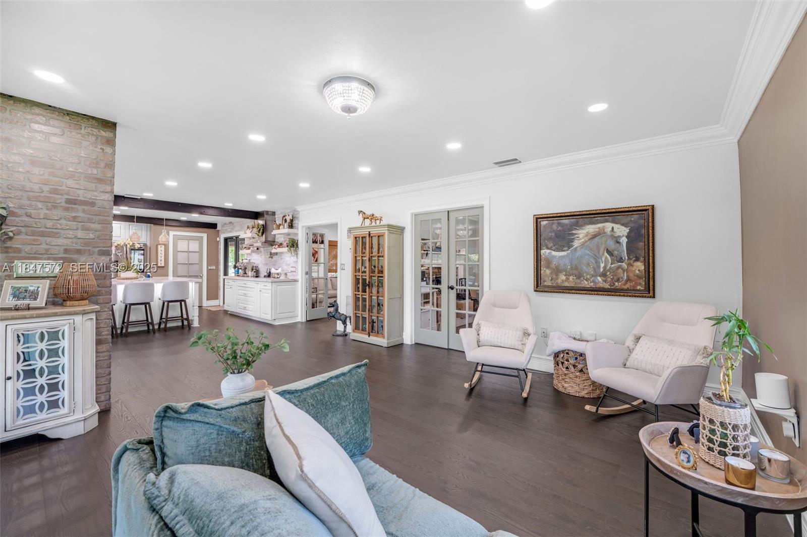 18200 Southwest 296th Street Homestead, FL 33030 - Photo 10 of 55 a living room with furniture and a table