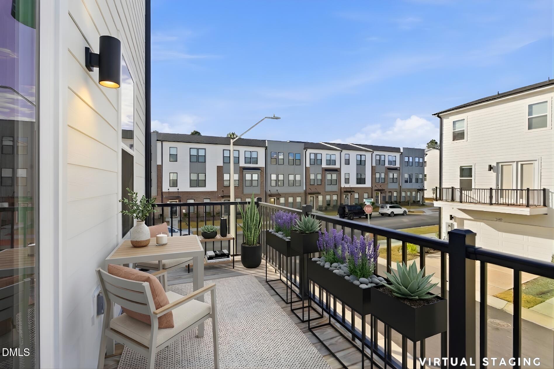 501 Hedrick Ridge Road Cary, NC 27519 - Photo 20 of 47 a balcony with city view