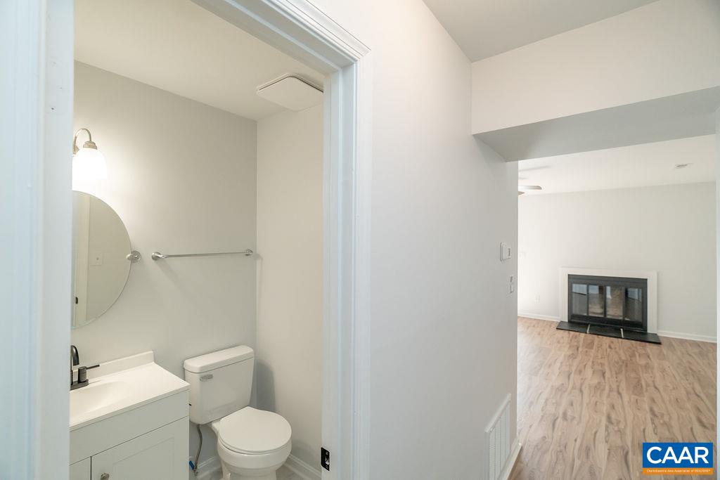 2087 Commonwealth Drive Charlottesville, VA 22901 - Photo 11 of 44 a bathroom with a toilet a sink and shower