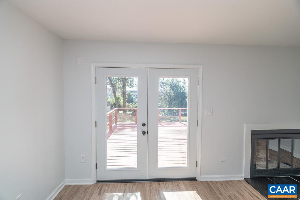2087 Commonwealth Drive Charlottesville, VA 22901 - Photo 15 of 44 a view of an empty room with a window