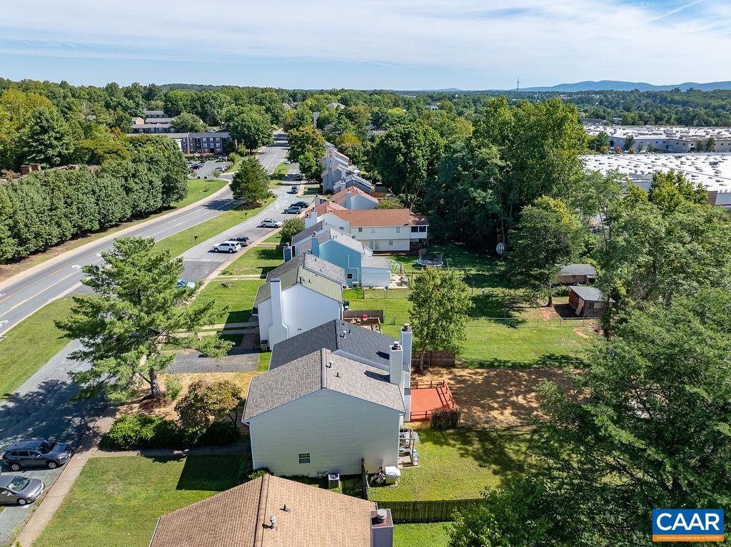 2087 Commonwealth Drive Charlottesville, VA 22901 - Photo 42 of 44 an aerial view of a city with lots of residential buildings ocean and mountain view in back