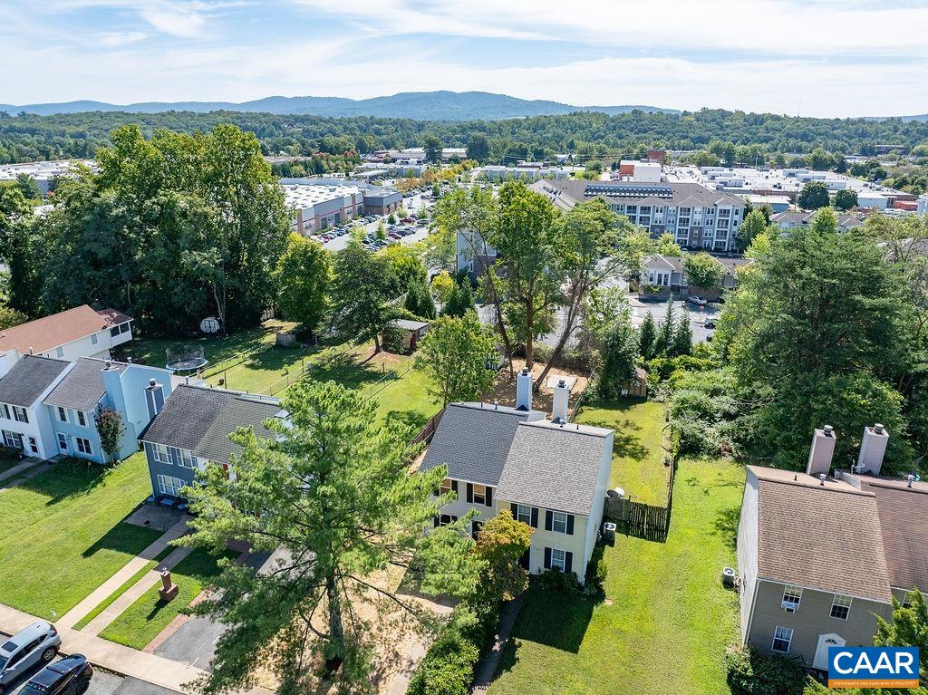 2087 Commonwealth Drive Charlottesville, VA 22901 - Photo 43 of 44 an aerial view of residential houses with outdoor space and trees