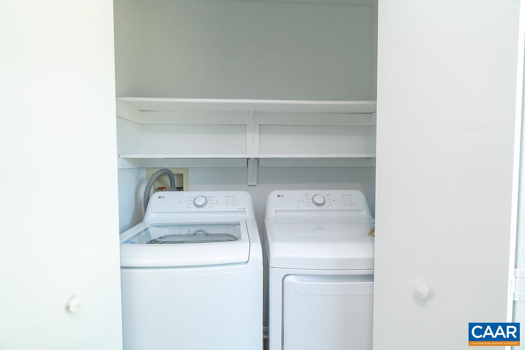 2087 Commonwealth Drive Charlottesville, VA 22901 - Photo 10 of 44 a view of storage and utility room with washer and dryer