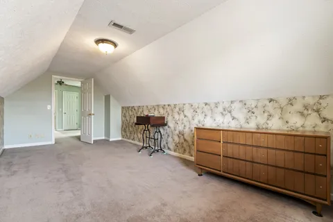 a view of a livingroom with furniture