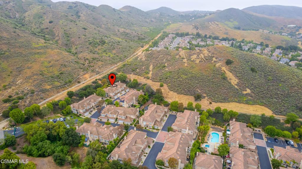 580 Fenwick Way, Unit C Simi Valley, CA 93065 - Photo 35 of 39 an aerial view of residential houses with outdoor space