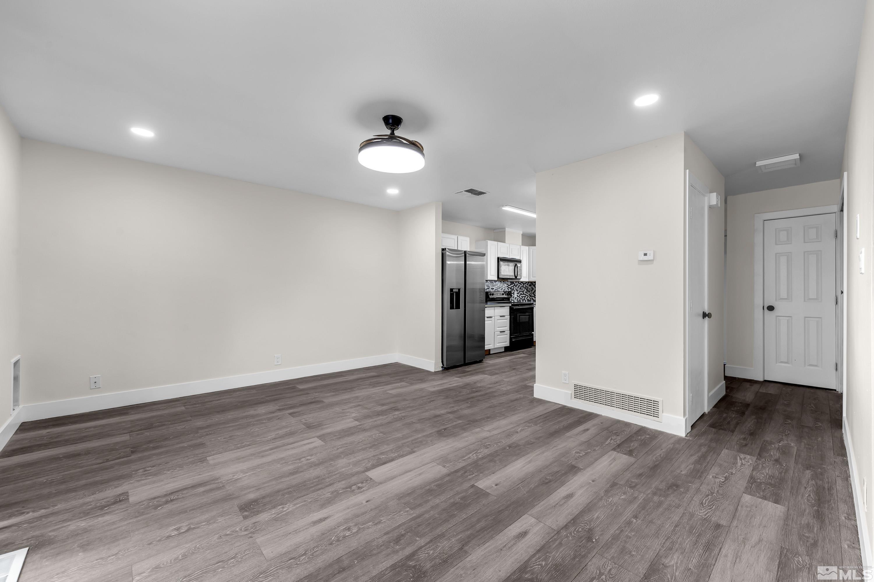 4 Smithridge Park Reno, NV 89502 - Photo 15 of 26 a view of empty room with wooden floor