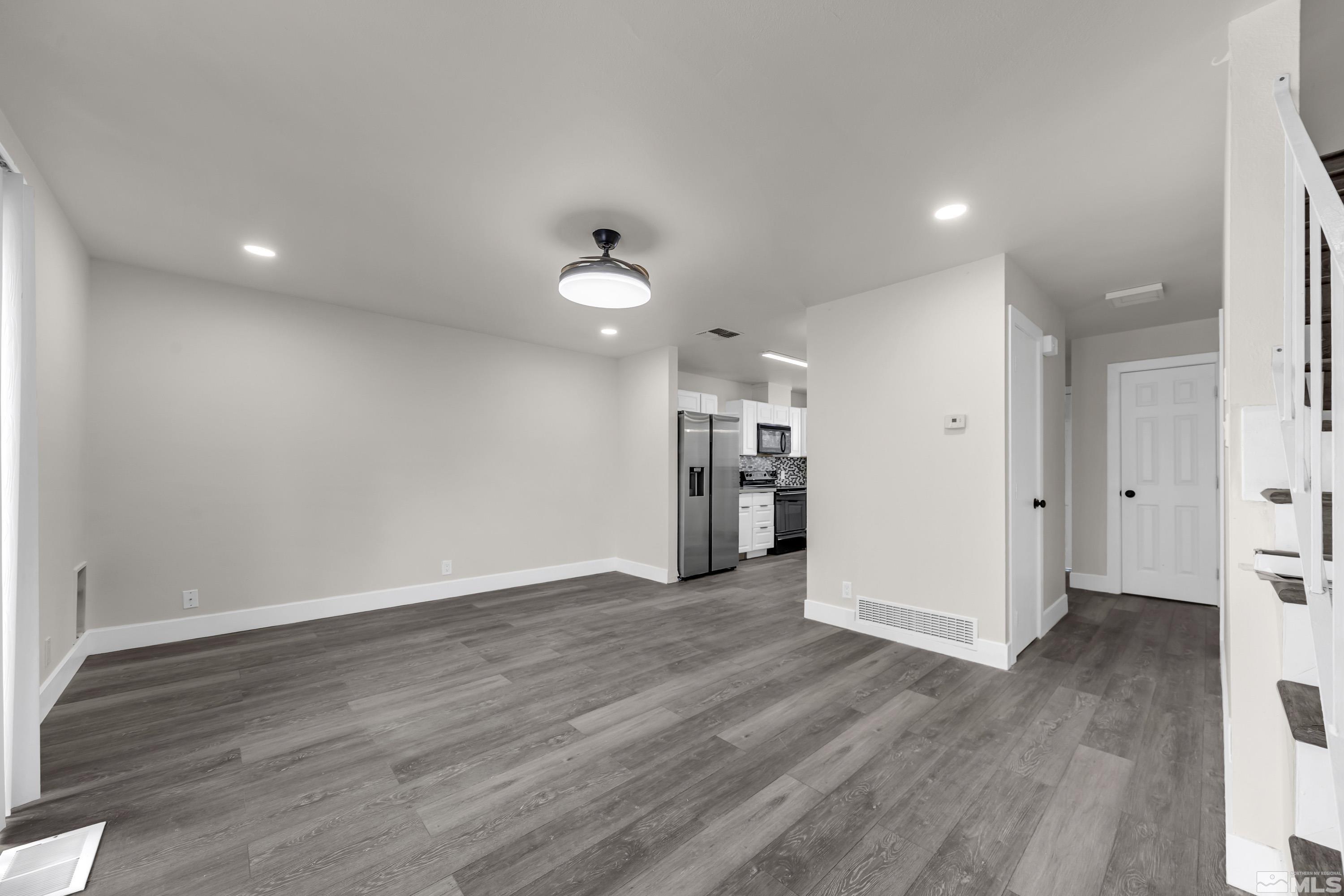 4 Smithridge Park Reno, NV 89502 - Photo 18 of 26 a view of empty room with wooden floor