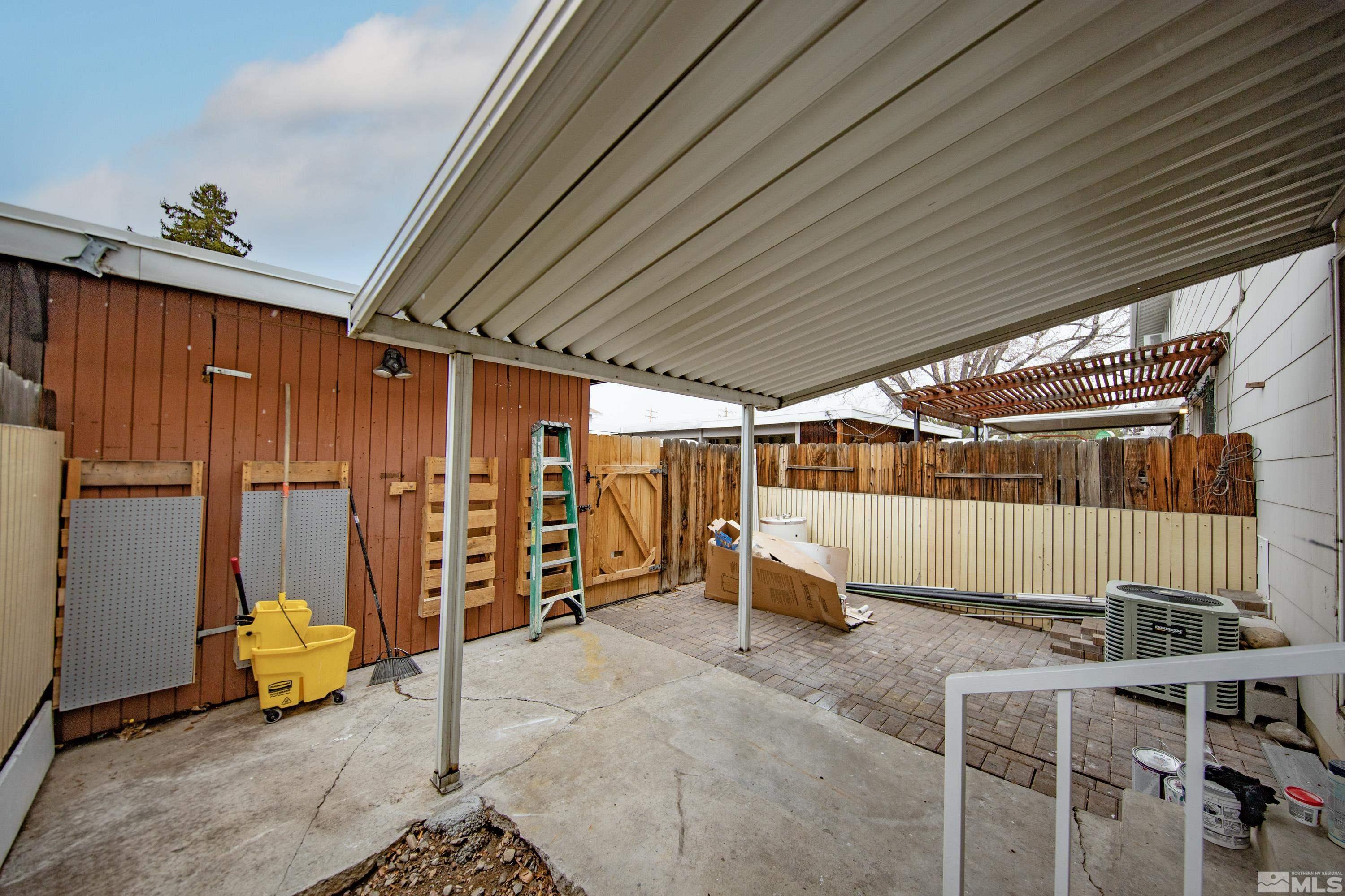 4 Smithridge Park Reno, NV 89502 - Photo 24 of 26 a view of a room with wooden walls