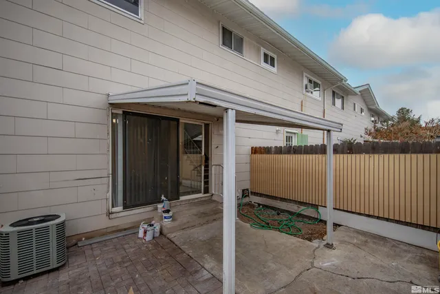a view of a house with backyard space