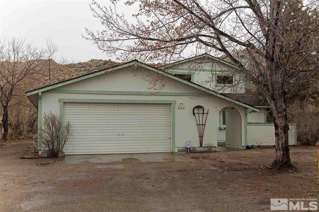 8644 Aquifer Way Reno, NV 89506 - Photo 1 of 1 a small white house with a outdoor space