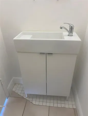 a bathroom with a sink and a toilet
